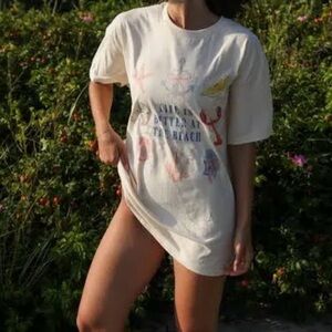 Life is better at the beach. Oversized tee. Size M/L but runs big. Worn once.